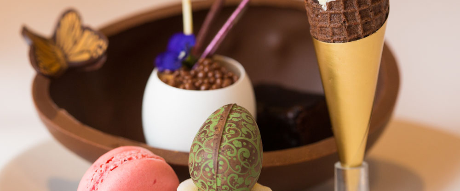 Image of a chocolate easter eggs with afternoon tea trimmings